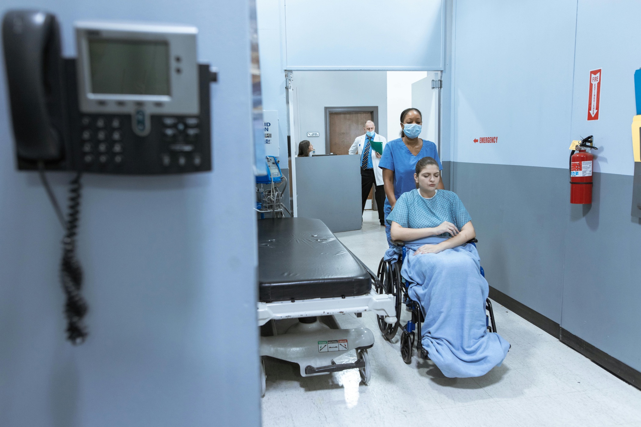 Caregiver supporting patient mobility